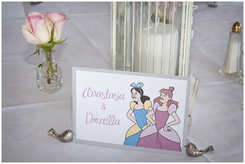 Enchantment Banquet Hall, table sign, anastasia and drizella, evil stepsisters, cinderella wedding, disney themed vow renewal