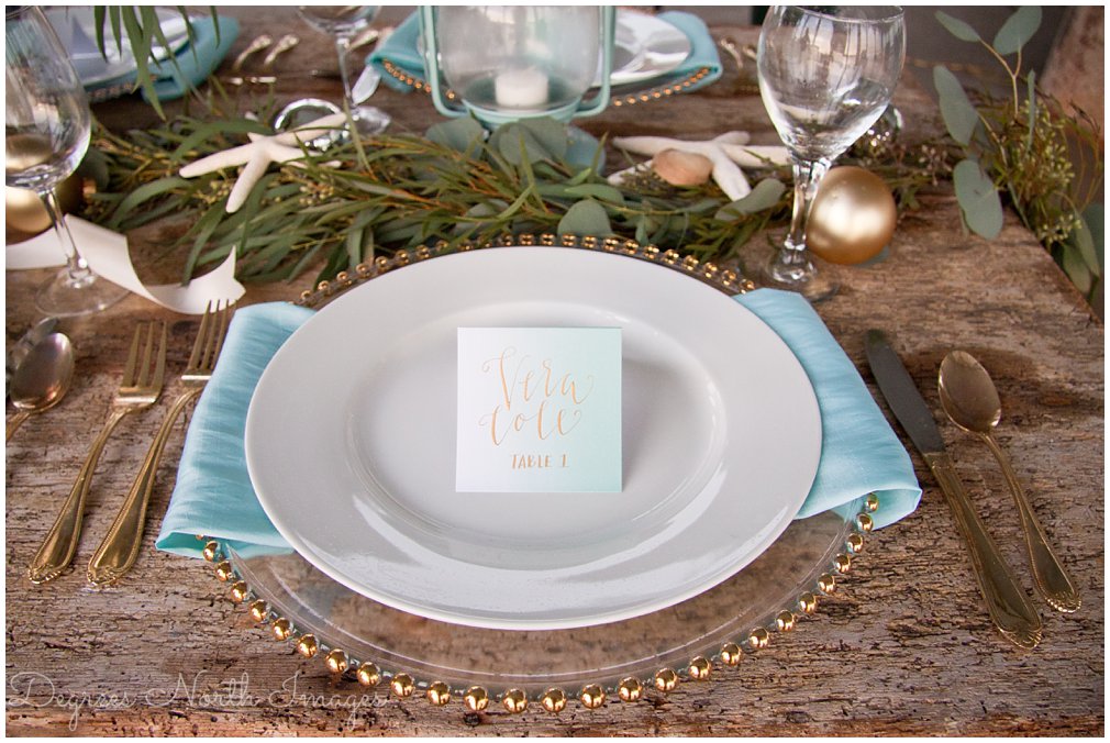 Aqua ombre place cards for intimate Christmas wedding