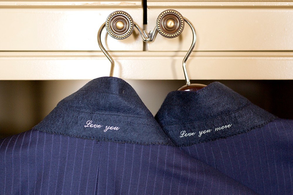 Balani custom groom suits at Hotel Icon getting ready suite