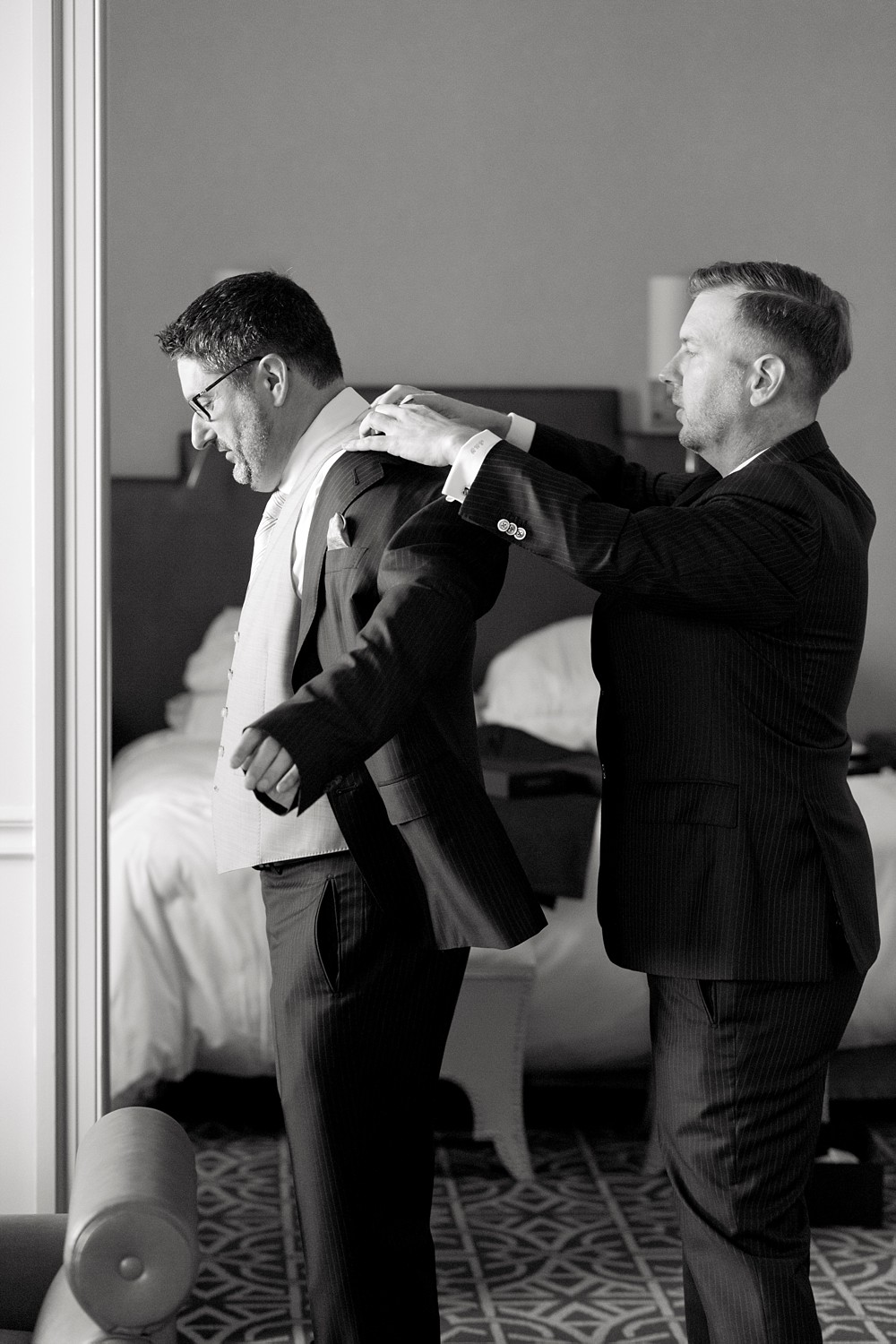 Grooms getting ready in Hotel Icon Suite