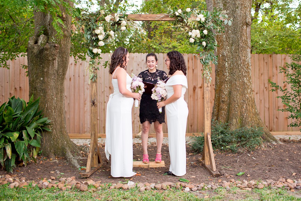 Brides at their backyard wedding ceremony