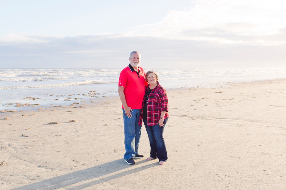 Grandparents at extended family beach session in Galveston