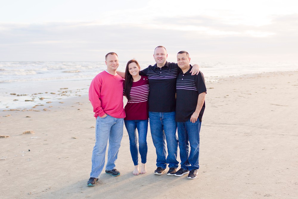adult siblings at extended family beach session in Galveston