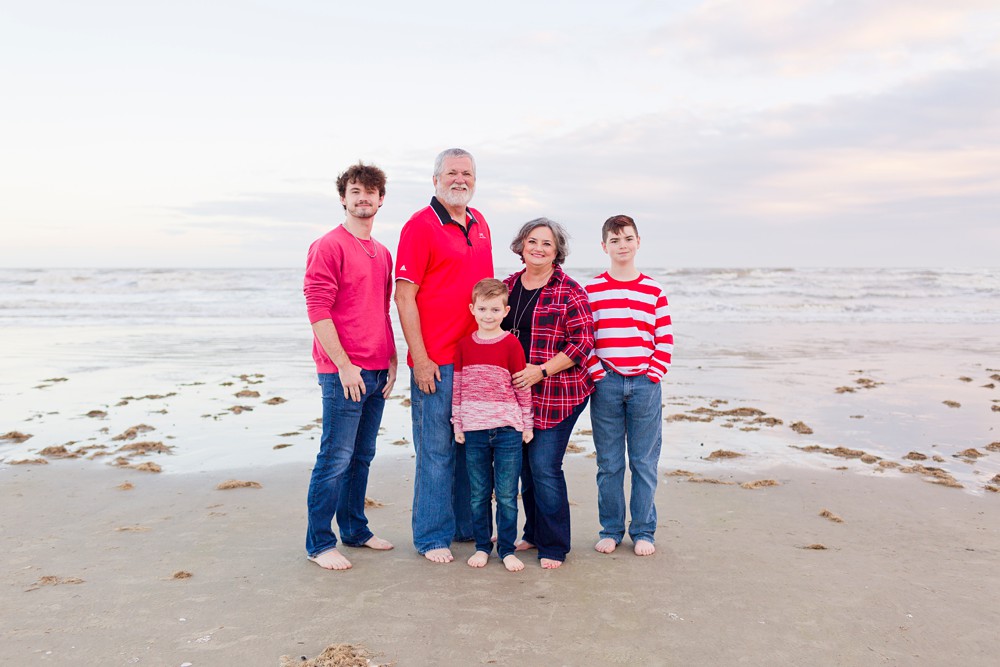Grandparents with grandkids at extended family beach session in Galveston