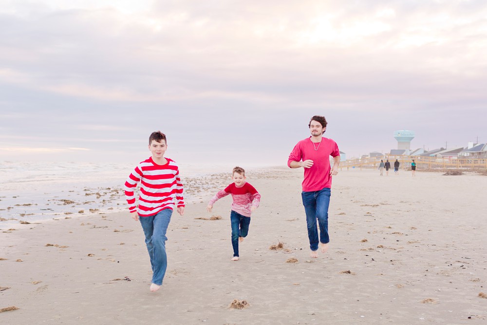 kids running down the beach in Galveston, Texas