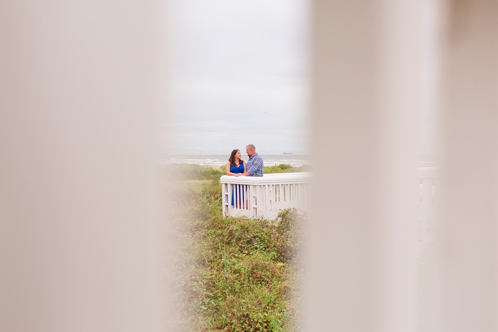 Couple on dune walkover on Galveston Island