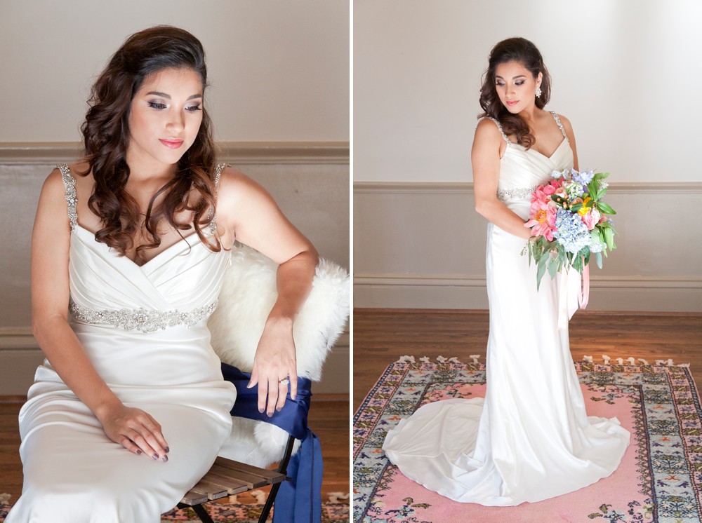 Bride in satin sheath dress with pink and blue bouquet