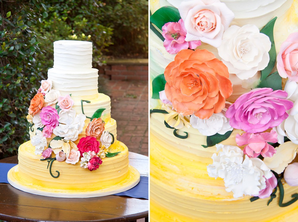 yellow ombre wedding cake with pink and fuchsia sugar flowers 