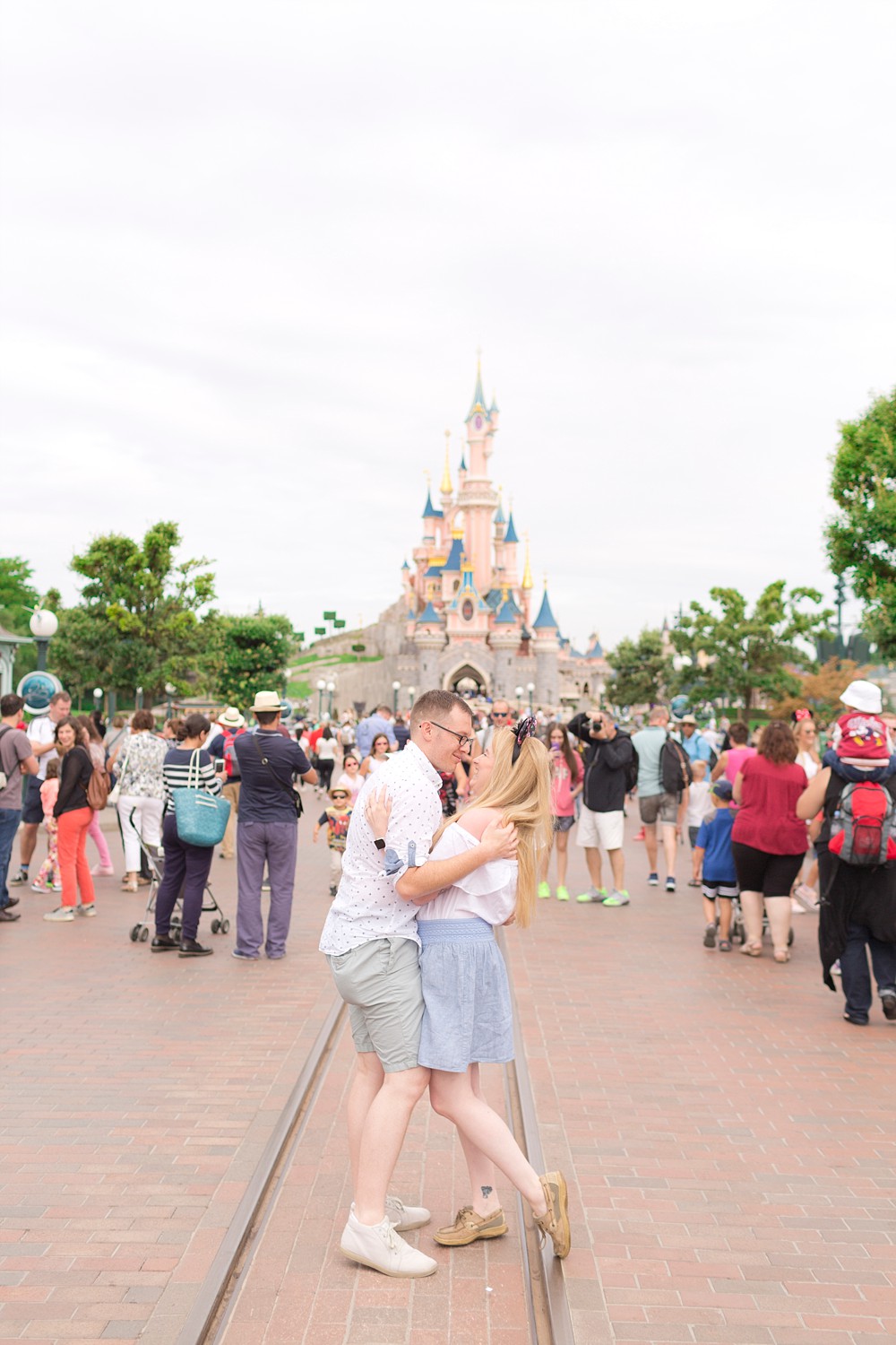 Proposal in front of Sleeping Beauty Castle at Disneyland Paris