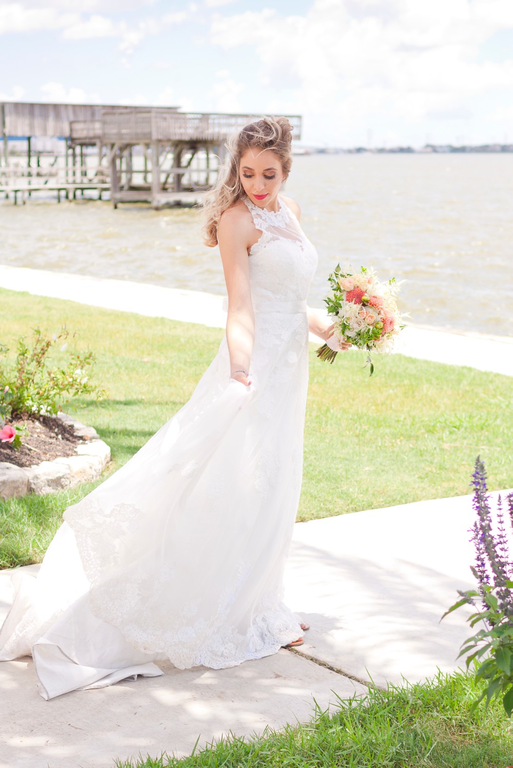 Windswept bridal portrait at Waters Edge Wedding Venue in Clear Lake Texas