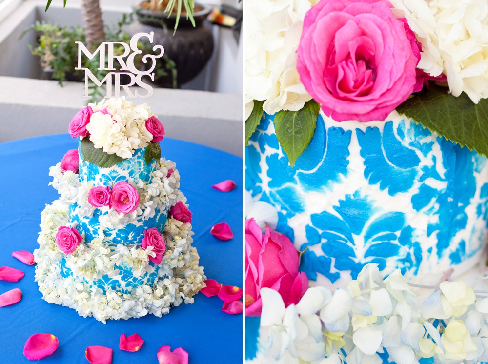 Mamma Mia wedding cake with blue damask pattern and hot pink flowers