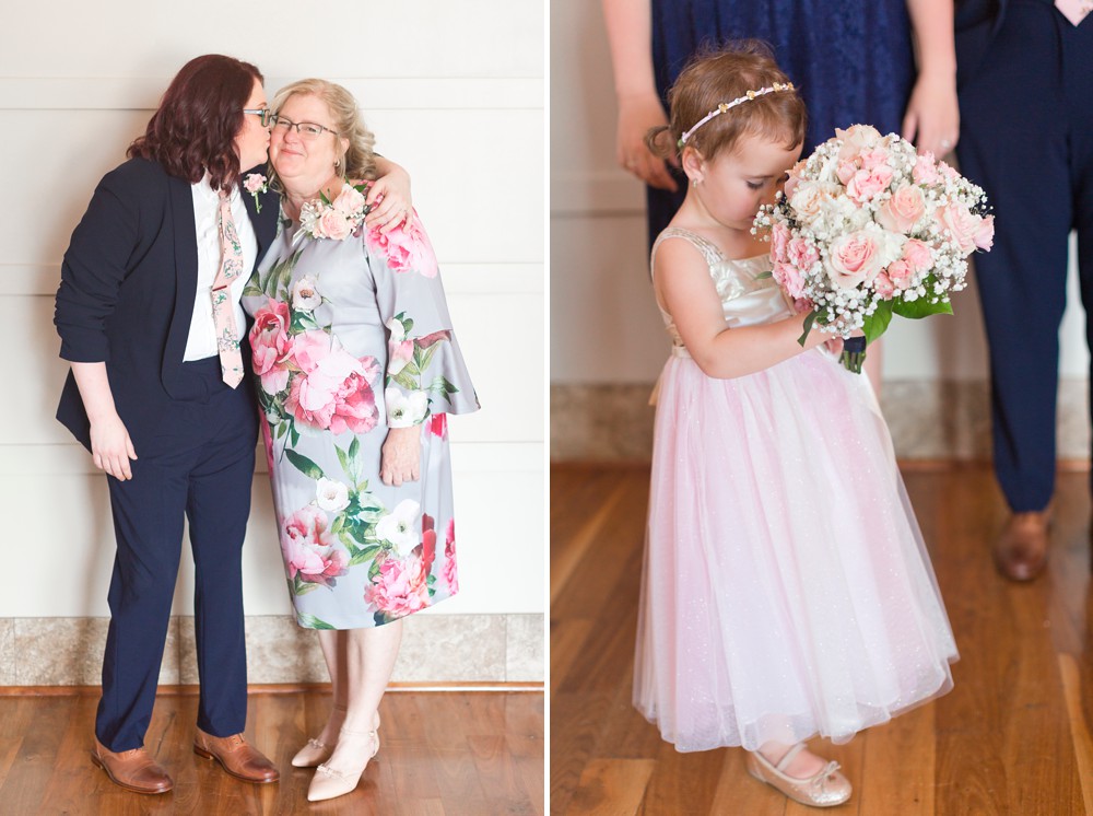 Bride kissing mom on the cheek and flower girl smelling bridal bouquet at modern wedding at Noah's