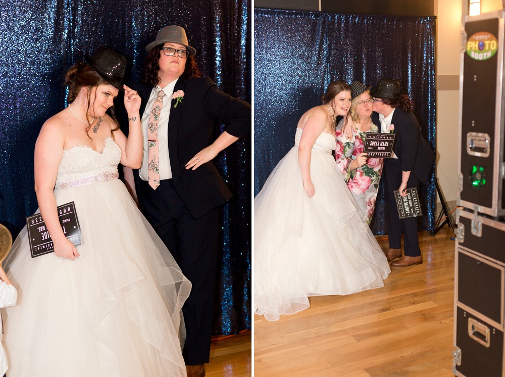 Brides having fun in the wedding photo booth