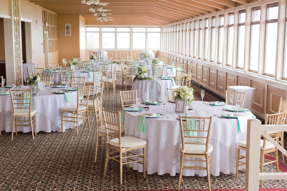 Tips for hiring a wedding photographer for wedding reception at the Summit Room at Mission Point Resort
