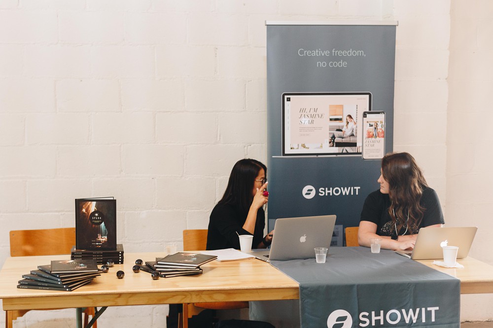 Showit booth at the Rising Tide Society Leaders Retreat in St. Paul Minnesota