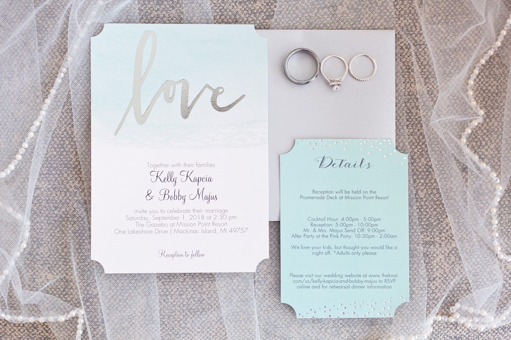 aqua and silver wedding invitation suite with wedding rings