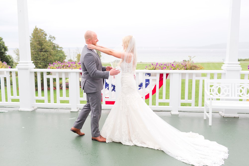 Bride and groom first look at destination wedding on Mackinac Island