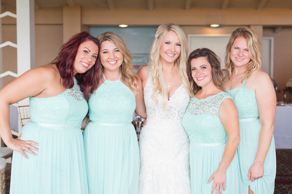 Bride with bridesmaids at wedding reception