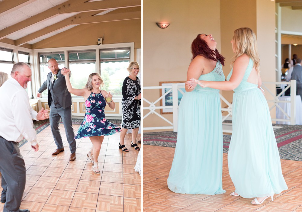 Groom dancing with sister, bridesmaid laughing