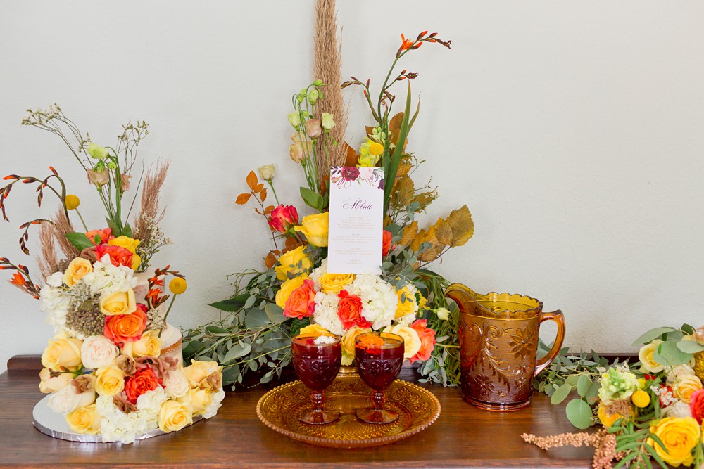 Wedding cake table display with sangria at Carr Mansion