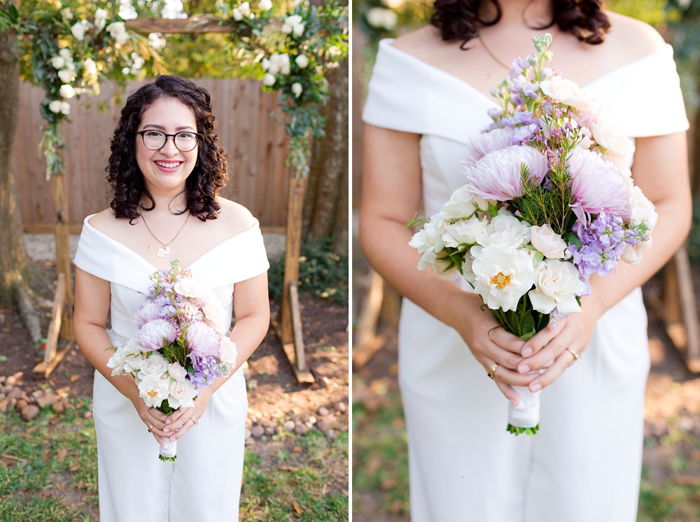 Bride in jumpsuit with purple and white bouquet