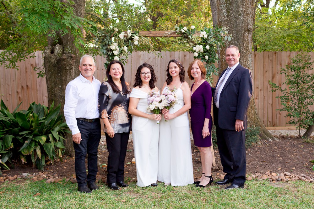 Formal photo of brides with their parents