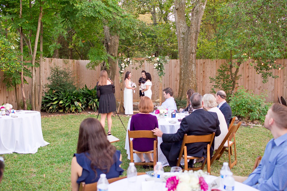 Brides at their backyard wedding ceremony
