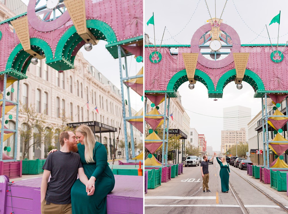 Couple posing under the Powell Mardi Gras Arch in Galveston