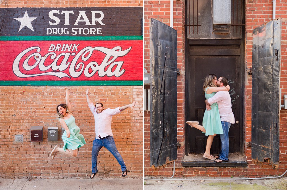 Couple jumping in front of the Star Drug Coca Cola mural in Galveston