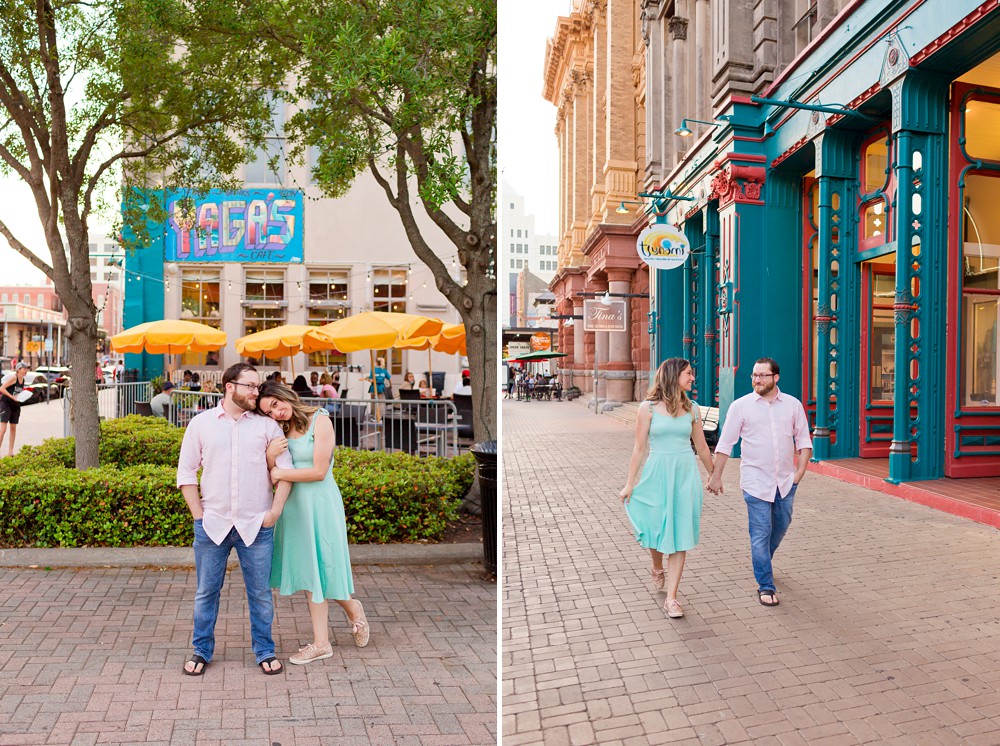 Couple walking on The Strand at their Galveston historic district engagement session