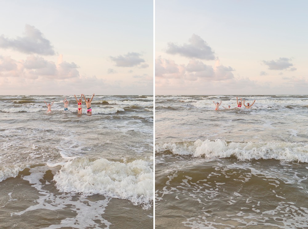 family diving into ocean waves