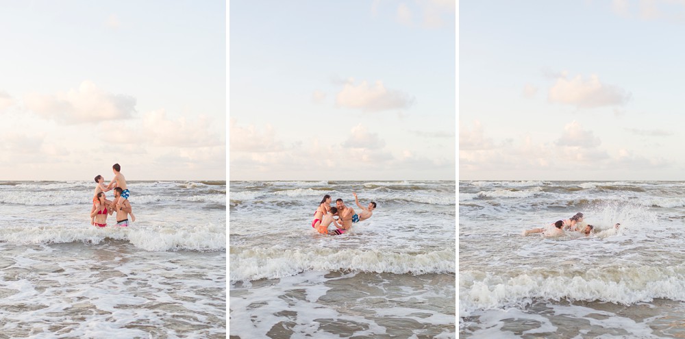 family playing in the ocean at their Galveston beach family session