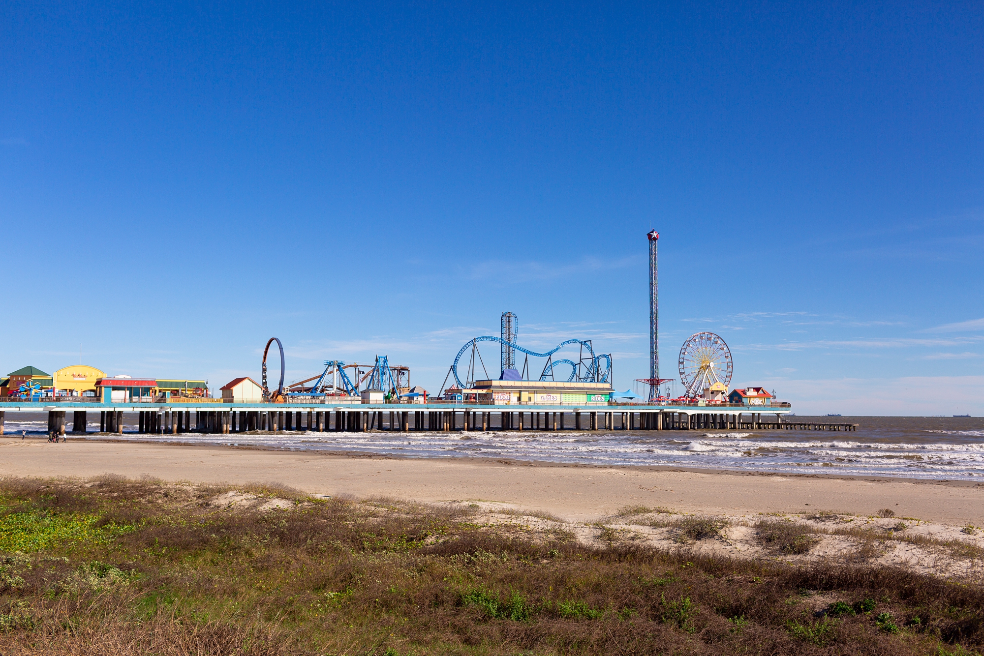 View of the Galveston Island Historic Pleasure Pier from the seawall
