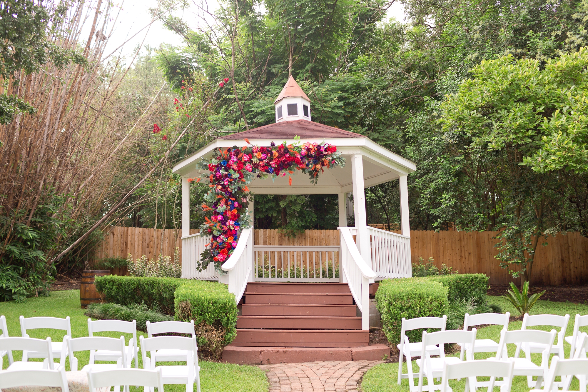 Wedding gazebo decorated with flowers at Brenner's on the Bayou