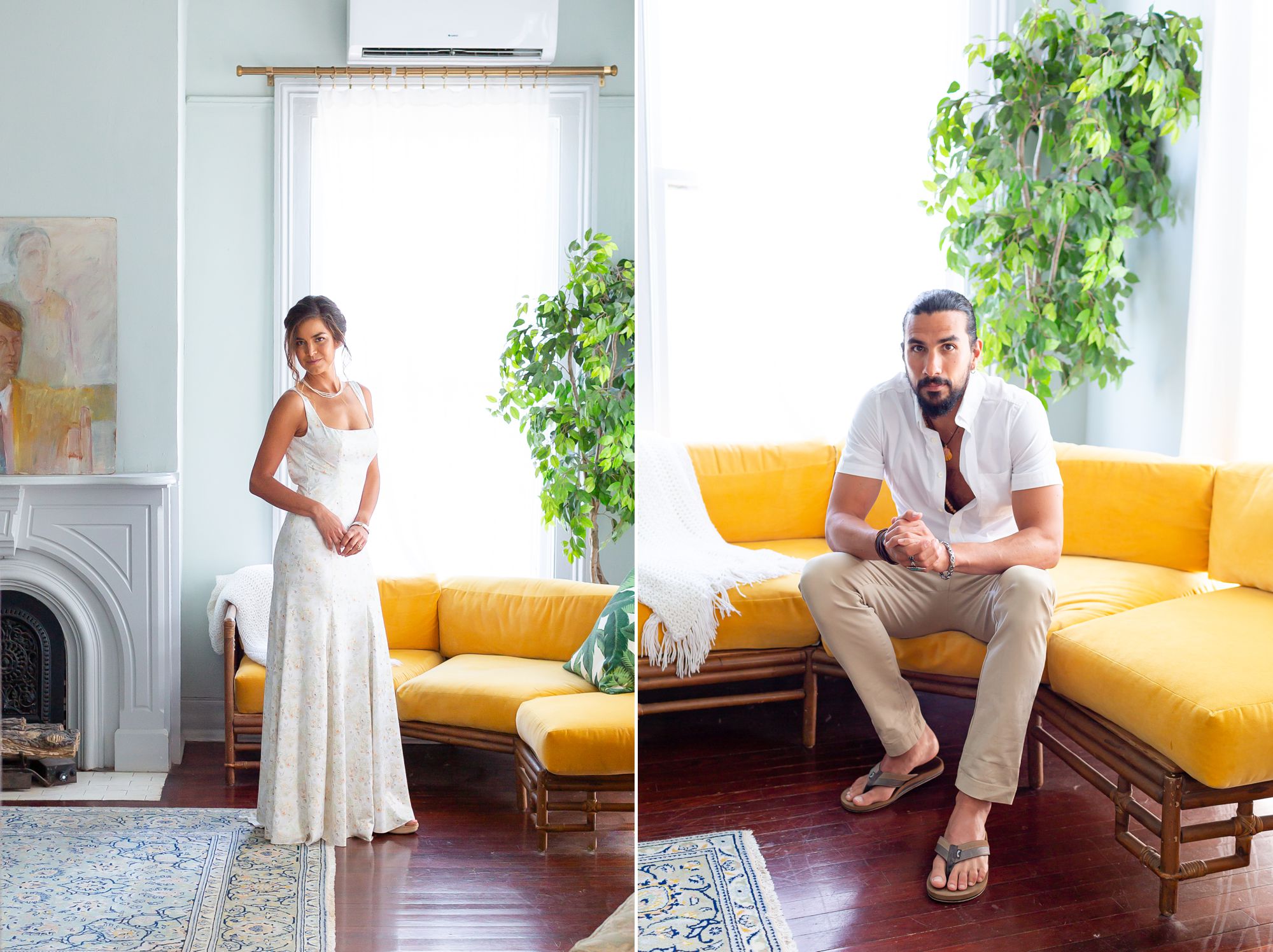 A bride stands in front of a window in her wedding gown; a groom sits on a yellow couch