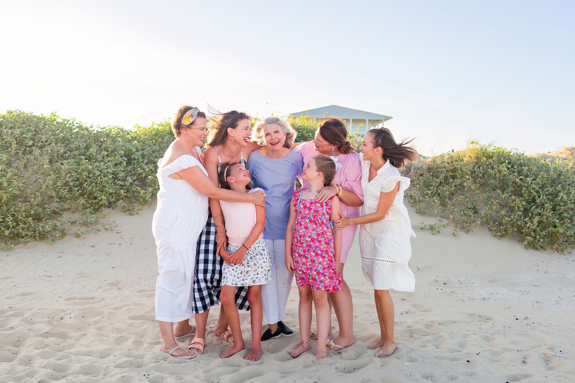 A grandmother stands with her daughters and granddaughters at a Crystal Beach Extended Family session in Texas.