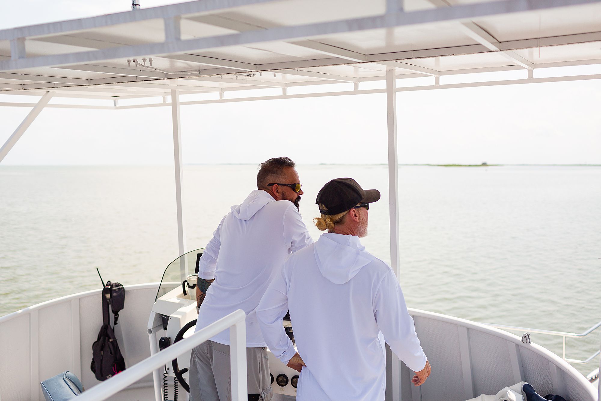 Great Escapes Yacht captains navigating through Galveston's West Bay.